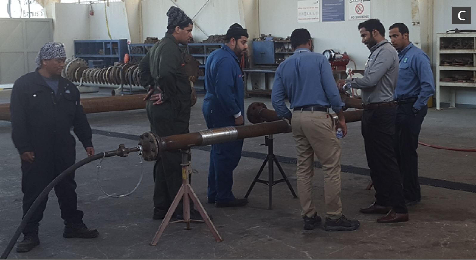 Saudi Aramco team inspecting the pipe assembly during hydrotesting